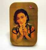 A delightful tin with an embossed Shanghai 1930's lady on the cover. Useful to carry small items tightly secured in this unusual very pretty tin.