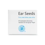 Small medicated herbal seed for non-invasive ear  and body point stimulation. Ready mounted on a clear plaster. The special seed has heat giving properties similar to moxa.