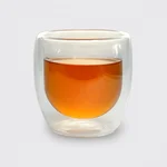 Stylish glass cup which keeps tea hot and does not burn your fingers.